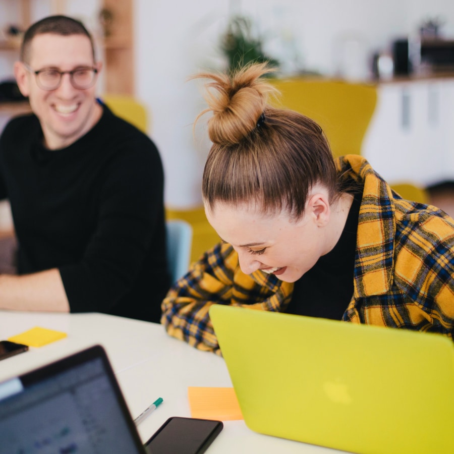 Image of two people in an office setting